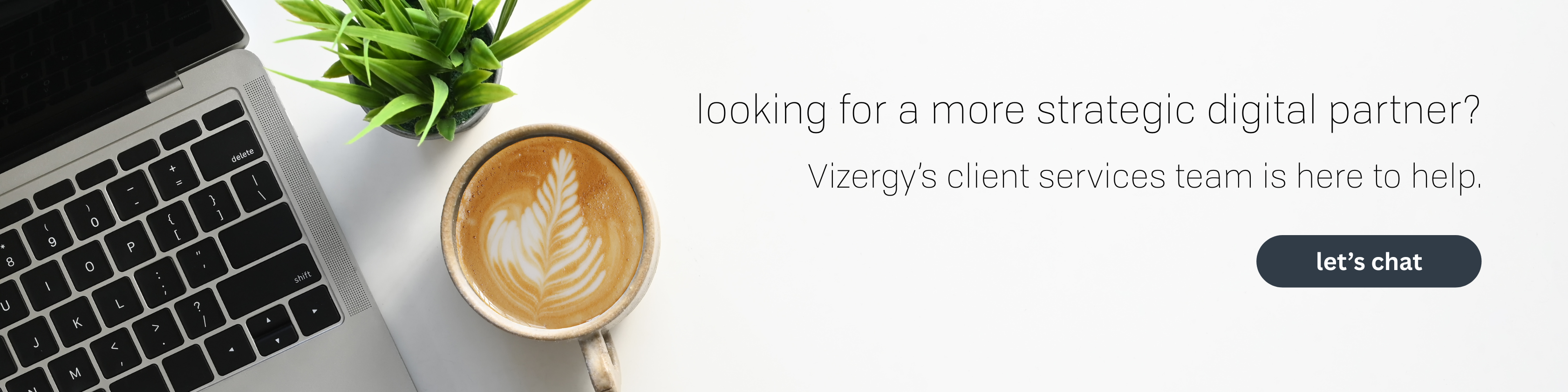 a cup of coffee with a heart design on top